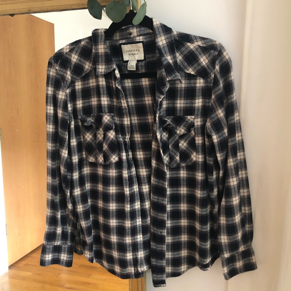 Neutral colored plaid flannel shirt
